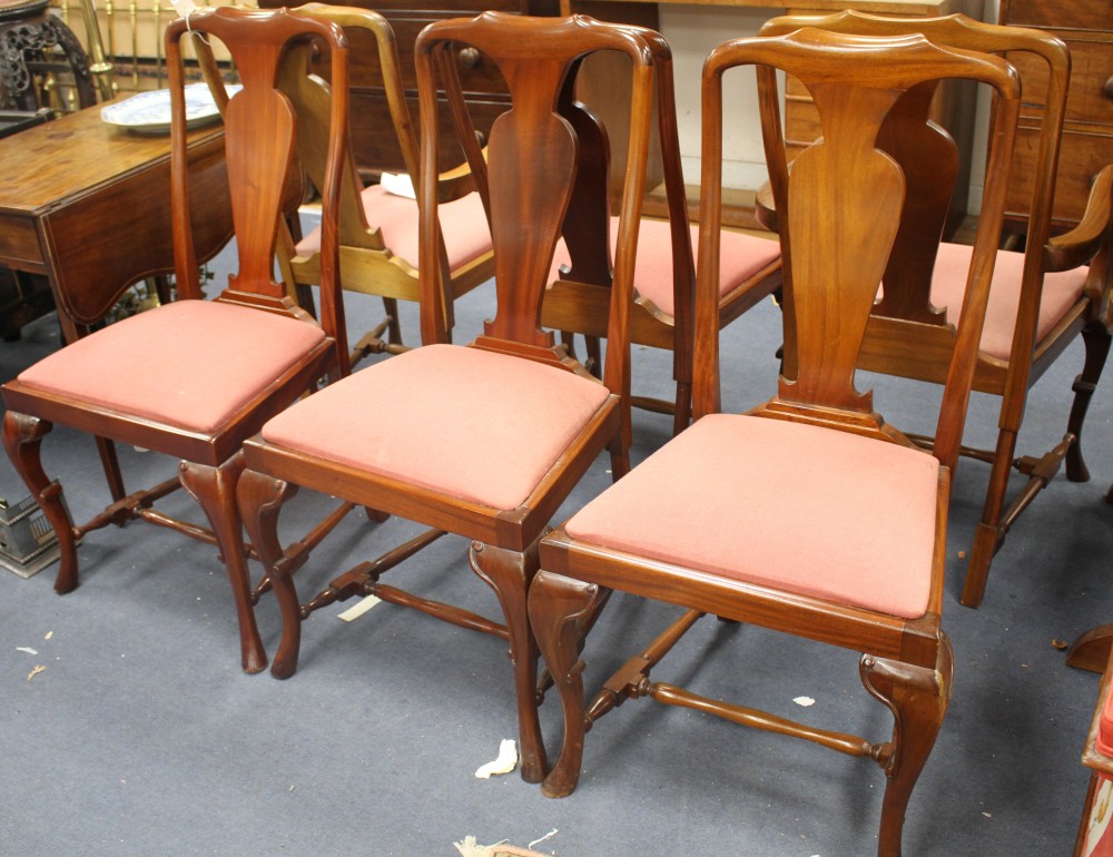 A set of six Queen Anne style mahogany dining chairs, including two carvers, with drop-in seats, carvers W.56cm D.16cm H.101cm